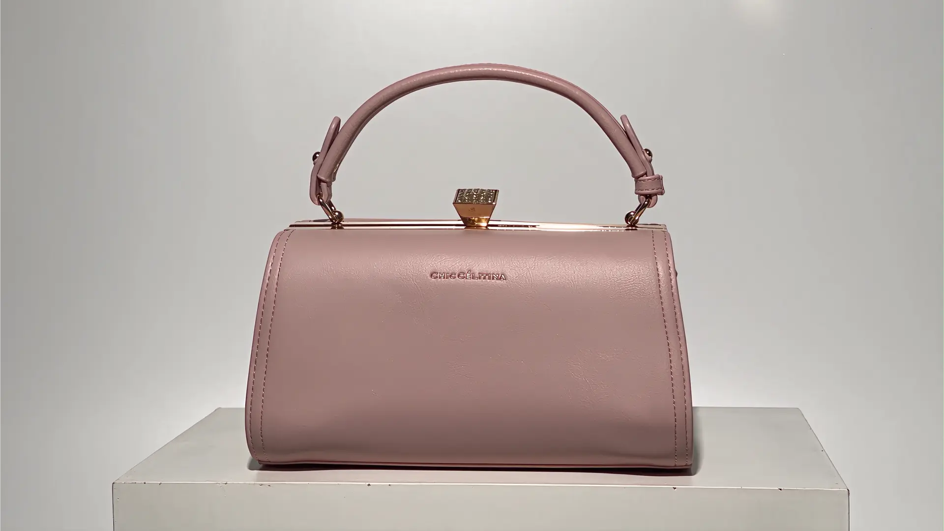 Bolso Rose de CHIC CÉLITINA PARIS en rosa palo con asa superior